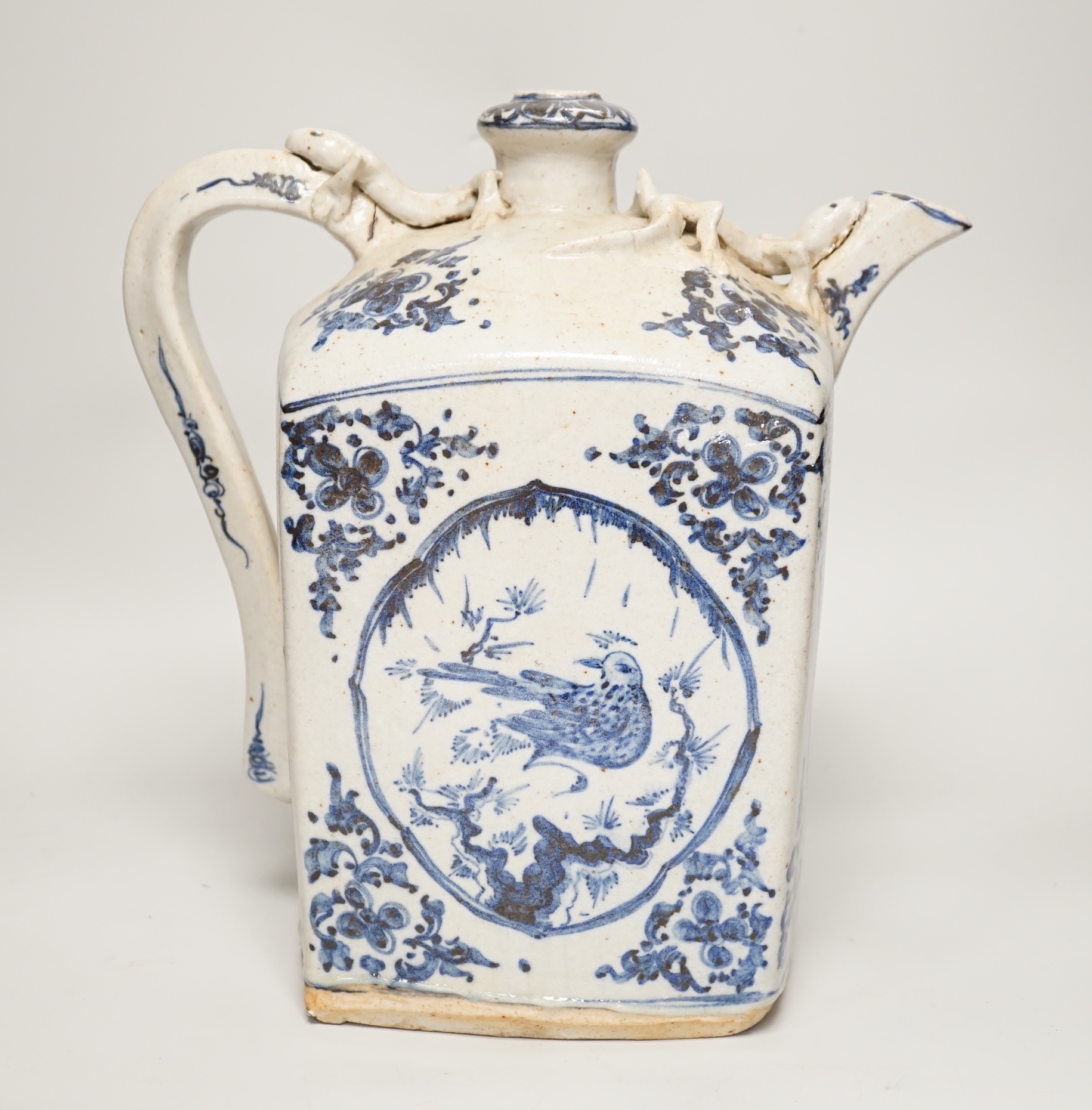 A blue and white Chinese pottery teapot, 31cm high